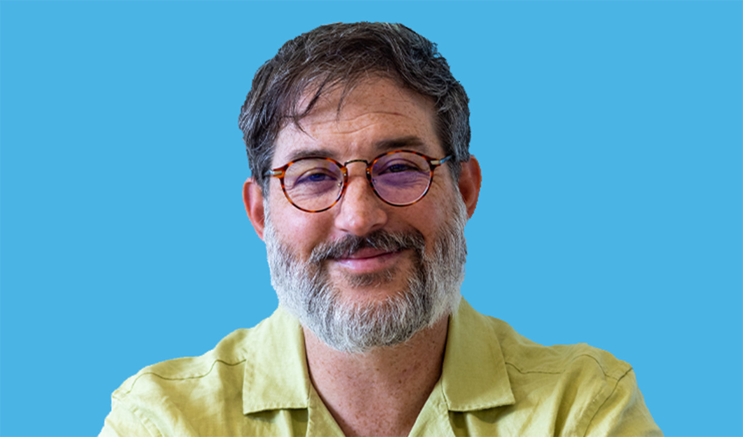 Headshot of man with glasses